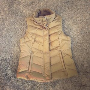 Eddie Bauer’s puffer vest, gold bronze color